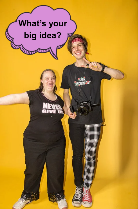 Two happy people dressed in fun clothing with a speech bubble saying what's your big idea